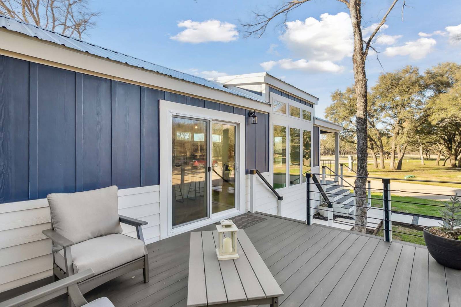 Diamond D1668B manufactured-home deck and exterior; model example, features and finishes vary