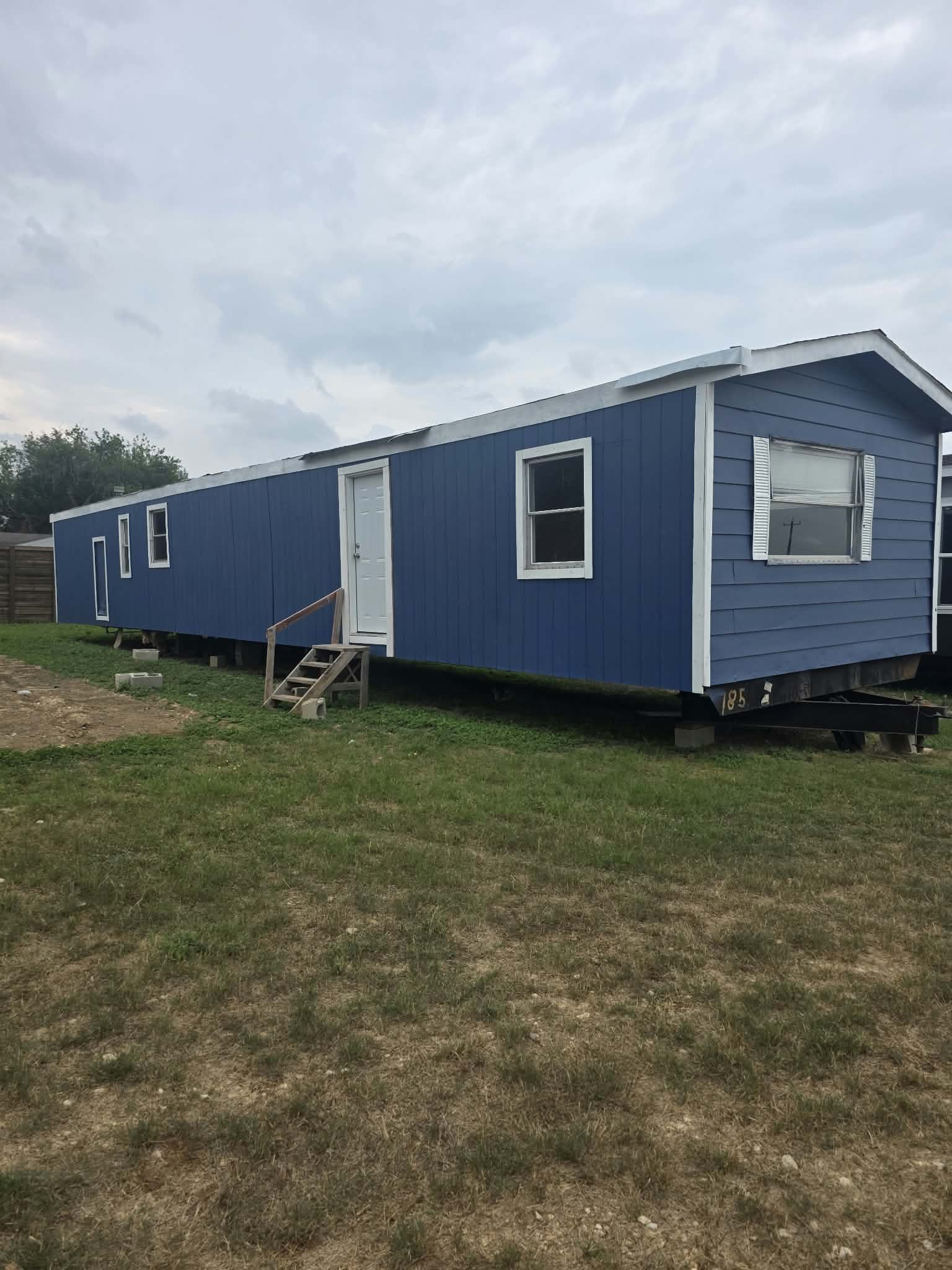 Blue Skyline single-wide exterior